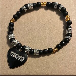 Collegiate Styled Black and Gold Beaded Bracelet with ‘Mom’Heart Charm